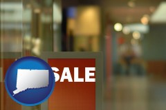 connecticut map icon and a department store display advertisement