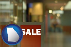 georgia map icon and a department store display advertisement