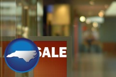 north-carolina map icon and a department store display advertisement