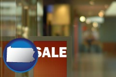 pennsylvania map icon and a department store display advertisement